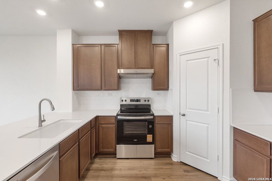 Furnished interior view inside a new home in Woodside Farms, Seguin (Image 10).