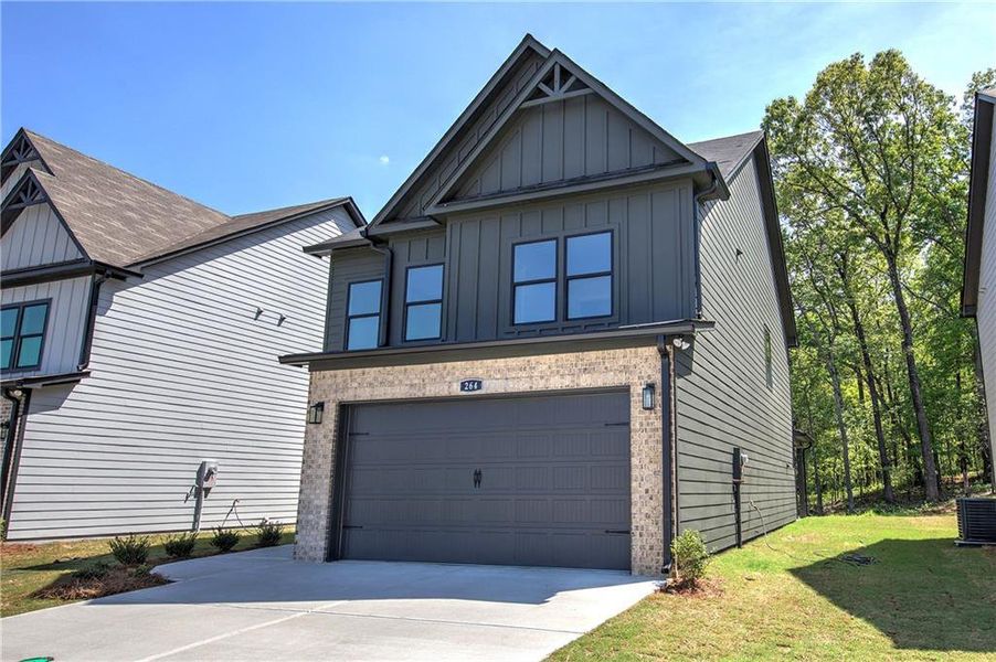 Front exterior of a new home in , Cartersville, GA, highlighting curb appeal (Image 18).