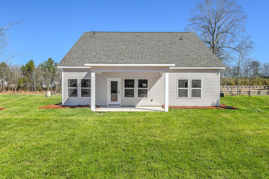 Exterior details and patio area of a home in , Holly Hill (Image 18).