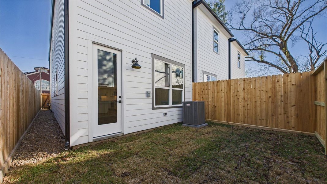 Exterior details and patio area of a home in , Houston (Image 24).
