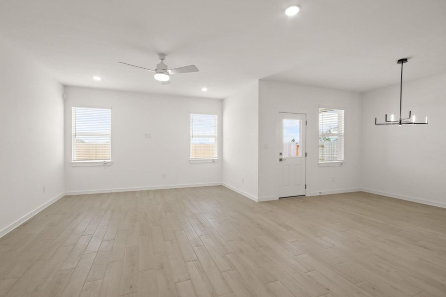 Bright and open great room and dining area Bright and open great room and dining area