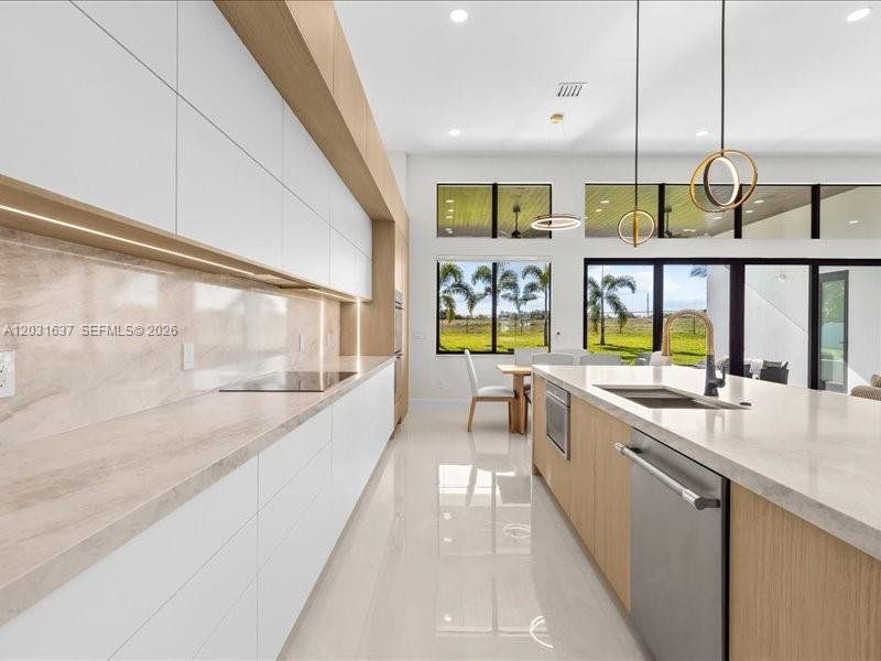 Furnished interior view inside a new home in , Port St. Lucie (Image 45).