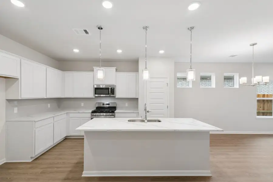 The Oakshire II- Kitchen with Island.  Sample image for illustration; upgrades, options, and colors may vary.