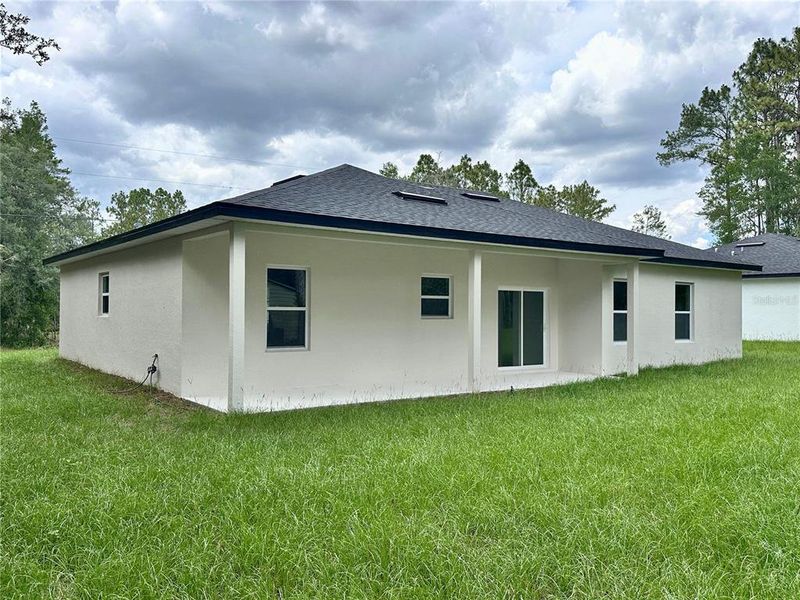 Exterior details and patio area of a home in , Citrus Springs (Image 19).