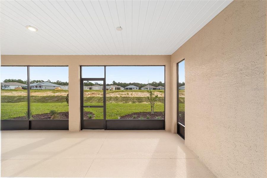 Exterior details and patio area of a home in On Top of the World Communities, Ocala (Image 4).