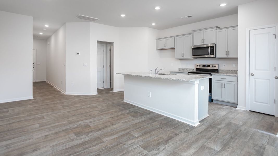 Furnished interior view inside a new home in The Gables at Edinborough Townes, Gibsonville (Image 5).