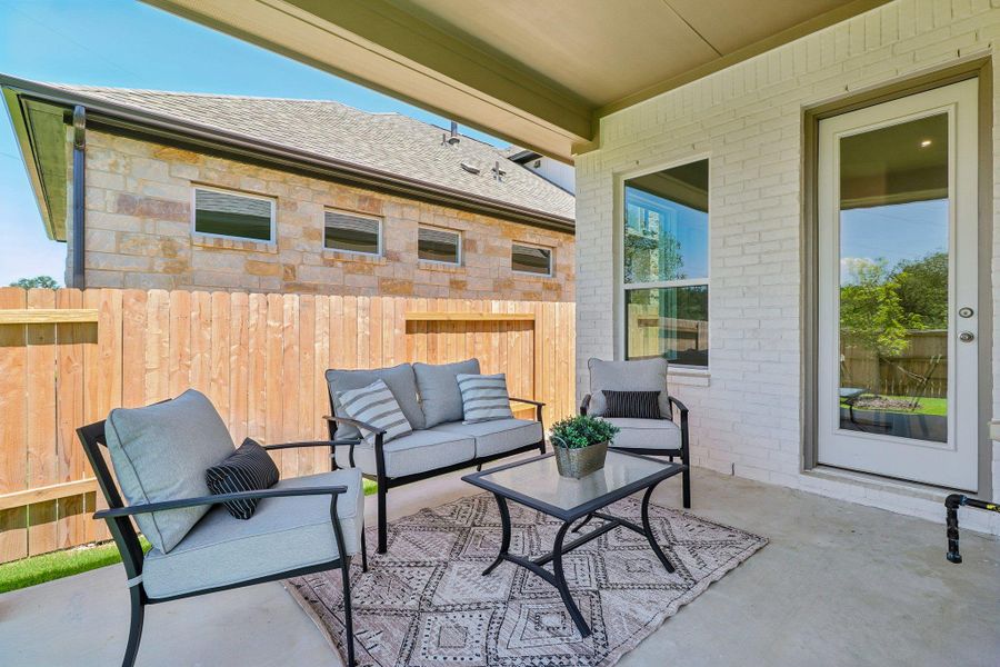 Exterior details and patio area of a home in Persimmon, Buda (Image 19).