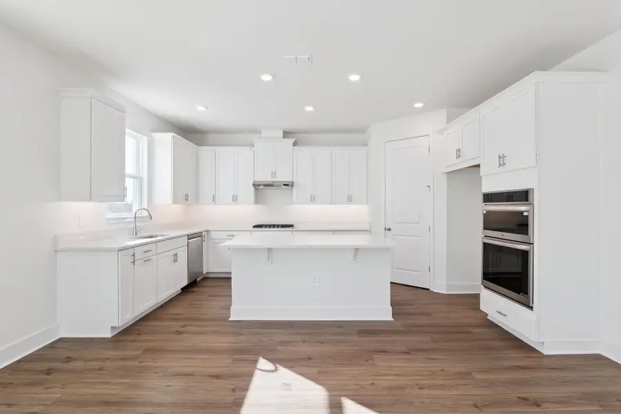 Representative furnished interior of a home built from the Clementine by Hartizen Homes in Eden Crest, Apopka (Image 7).