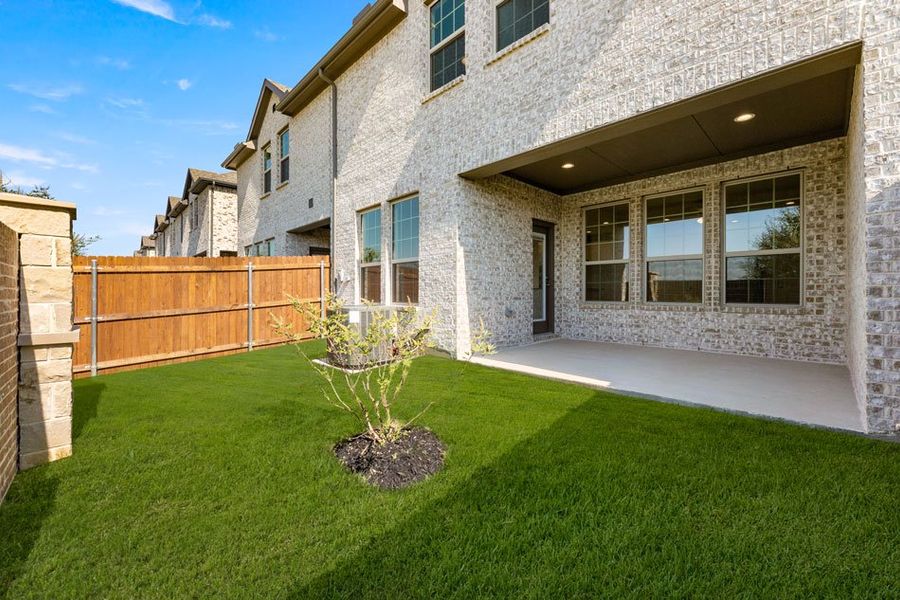 Front exterior of a new home in Main Street Village, Mansfield, TX, highlighting curb appeal (Image 28).