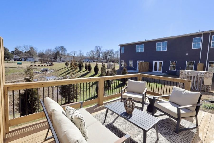 Exterior details and patio area of a home in The Eleuthera, Chattanooga (Image 26).