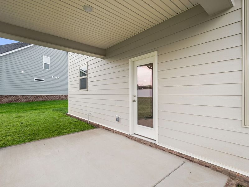 Exterior details and patio area of a home in Woods Crossing, Gallatin (Image 24).