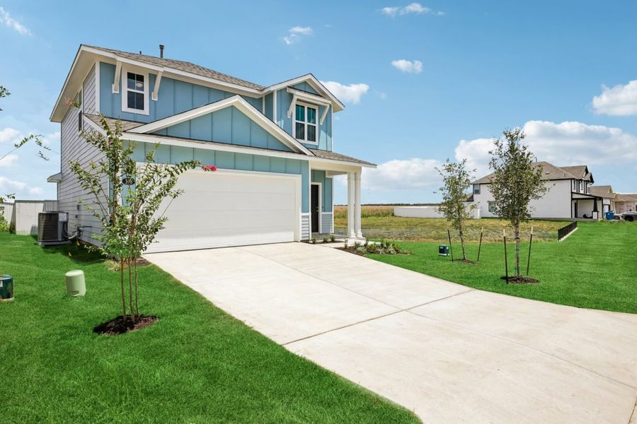 Front exterior of a new home in Harvest Ridge, Elgin, TX, highlighting curb appeal (Image 17).