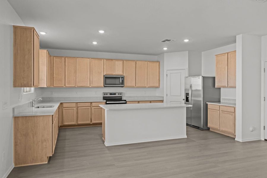 Furnished interior view inside a new home in Skyline Village Enclaves, San Tan Valley (Image 3).