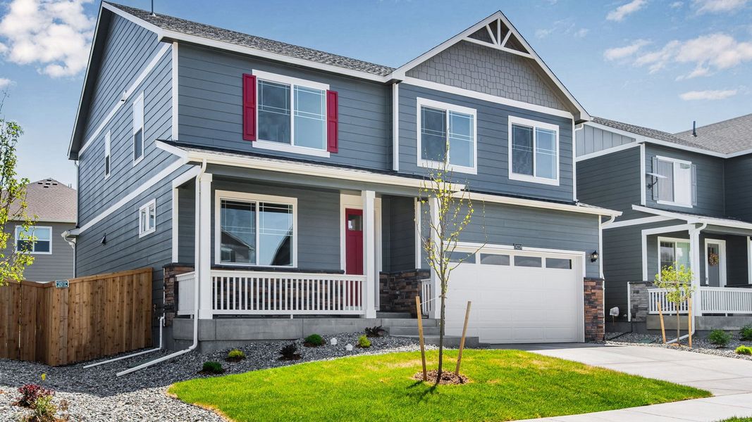 Front exterior of a new home in Trails at Crowfoot, Parker, CO, highlighting curb appeal (Image 2).