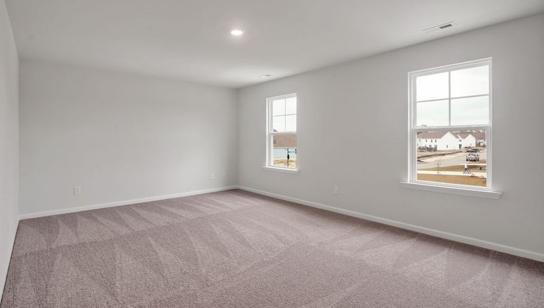 Representative unfurnished interior of a home built from the GLYNN by D.R. Horton in Grayson Park, Leland (Image 24).