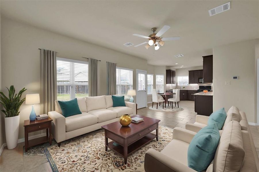 Virtually Staged Grand room open to kitchen (view from bottom of stairs)