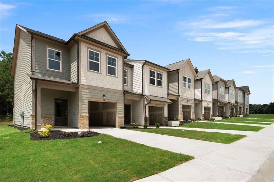 Front exterior of a new home in , Cedartown, GA, highlighting curb appeal (Image 45).
