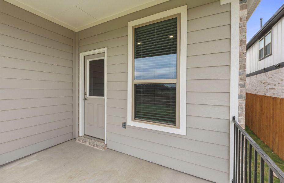 Exterior details and patio area of a home in Saddleback at Santa Rita Ranch, Liberty Hill (Image 4).