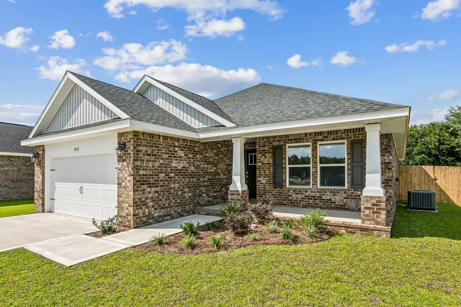 Representative exterior photo of a completed home built from the The Carlos by Herbst Homes in Buckeyes Landing, Navarre, FL (Image 33). Representative exterior photo of a completed home built from the The Carlos by Herbst Homes in Buckeyes Landing, Navarre, FL (Image 33).