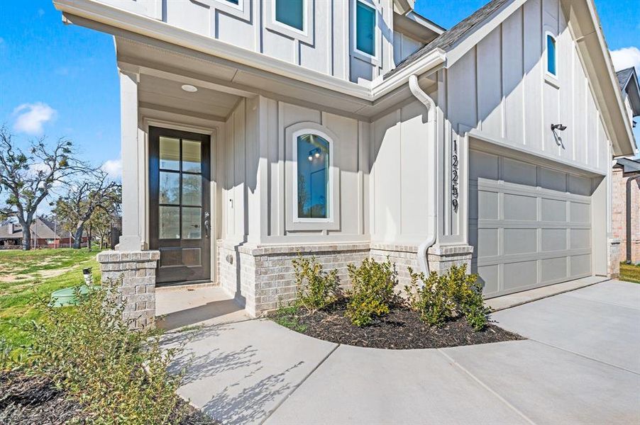 Exterior details and patio area of a home in The Resort on Eagle Mt. Lake, Fort Worth (Image 3).