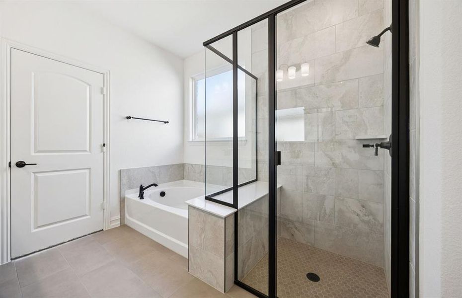 Owner's bath with large shower and tub