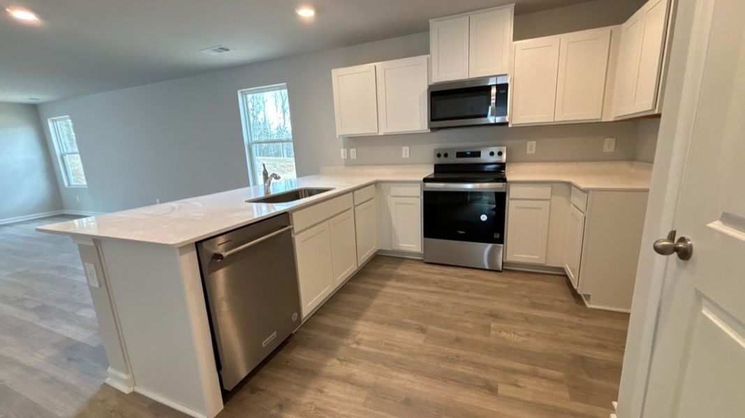 Representative furnished interior of a home built from the CAMERON by D.R. Horton in Saddle Trace, Lewisburg (Image 9).