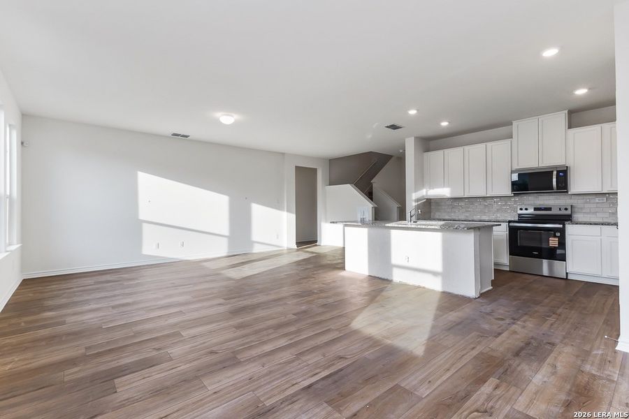 Spacious, unfurnished interior of a new home in Preserve at Culebra - Classic Collection, San Antonio (Image 12).