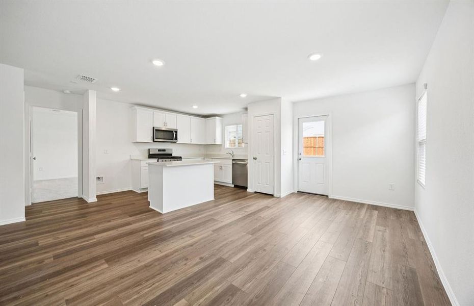 Spacious eat-in kitchen designed with a nice island for dining