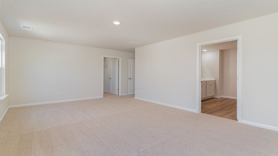 Representative unfurnished interior of a home built from the ROBIE by D.R. Horton in Sandridge Park, Little River (Image 21).