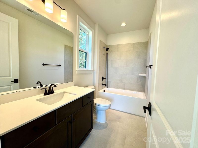 Furnished interior view inside a new home in Saddlehorn, Troutman (Image 13).