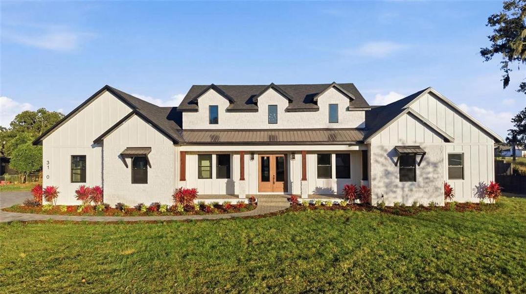 Front exterior of a new home in , Plant City, FL, highlighting curb appeal (Image 31).