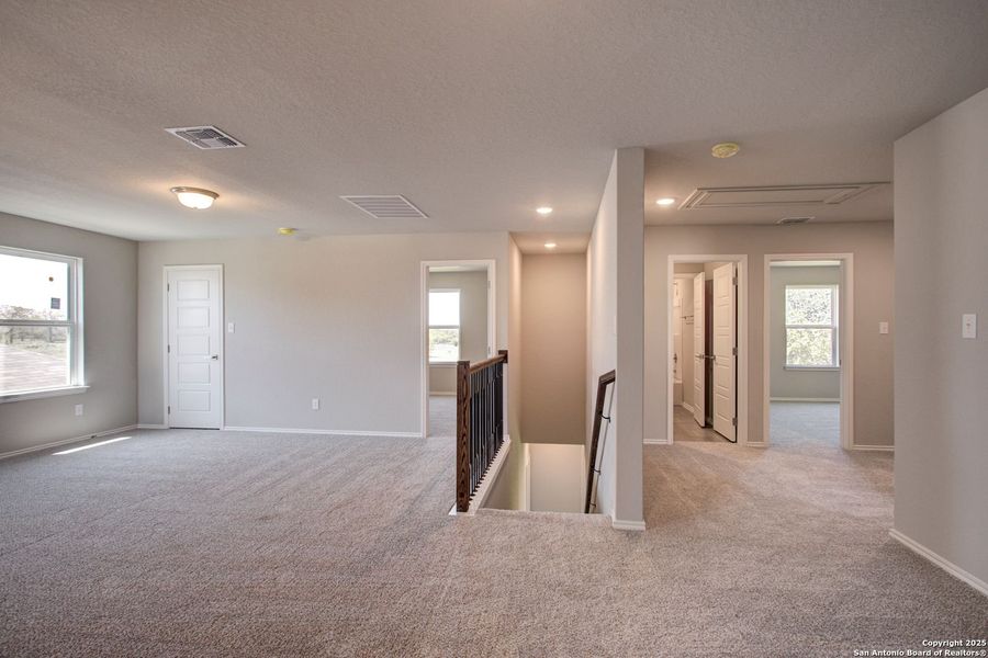 Spacious, unfurnished interior of a new home in Hickory Ridge, San Antonio (Image 61).