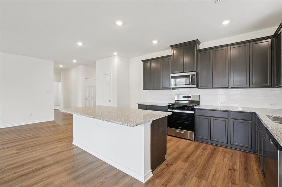 Furnished interior view inside a new home in Heartland Signature, Heartland (Image 6).