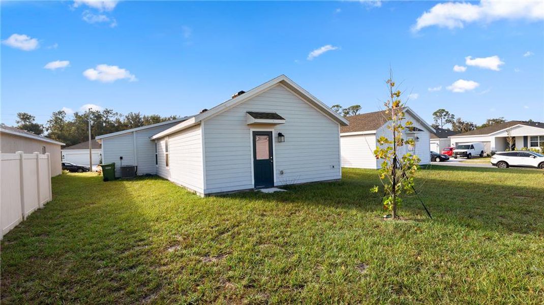 Exterior details and patio area of a home in Peace Creek Reserve: Legacy Collection, Winter Haven (Image 4).