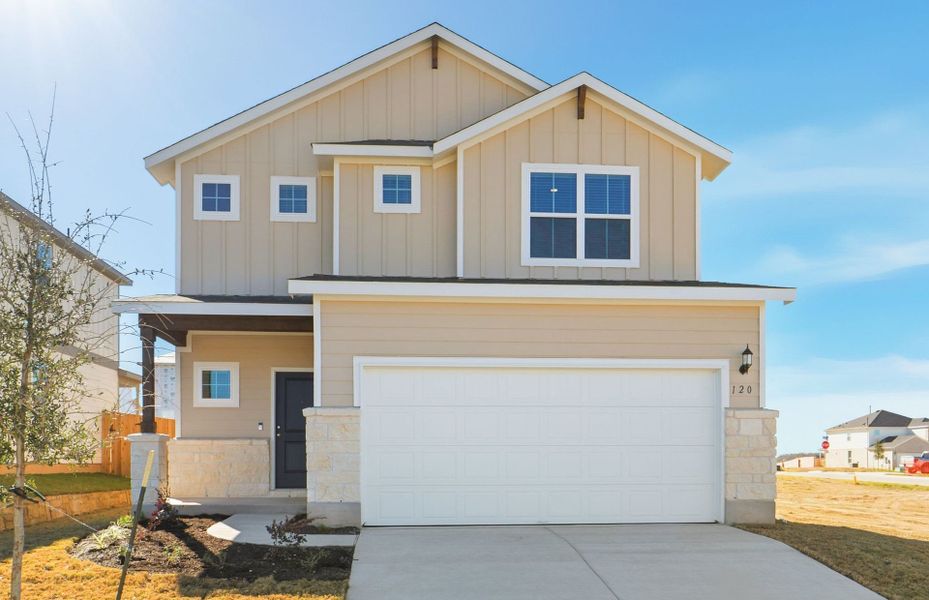 Front exterior of a new home in Sunfield, Buda, TX, highlighting curb appeal (Image 22).