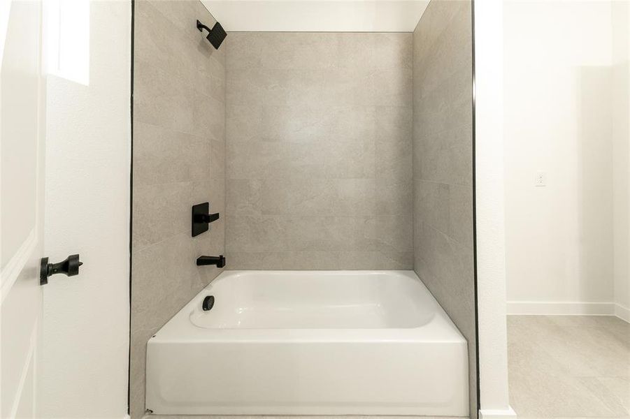 Bathroom with shower / tub combination