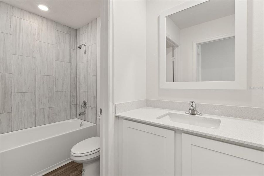 Furnished interior view inside a new home in Peach Crossings, Winter Haven (Image 9).
