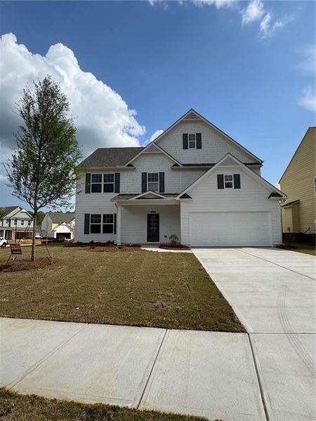 Front exterior of a new home in , Canton, GA, highlighting curb appeal (Image 2). Front exterior of a new home in , Canton, GA, highlighting curb appeal (Image 2).