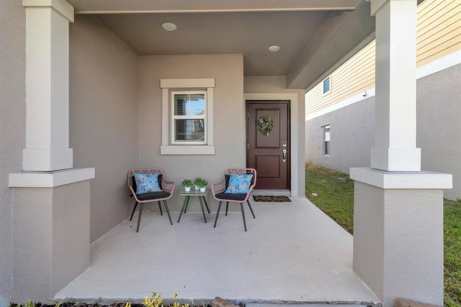 Exterior details and patio area of a home in Cascades, Davenport (Image 3).