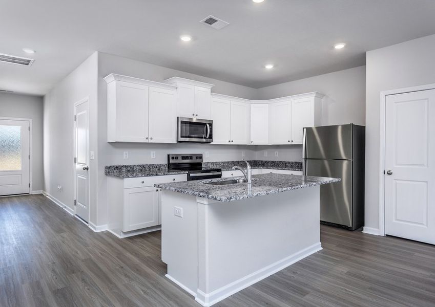 The kitchen has granite countertops