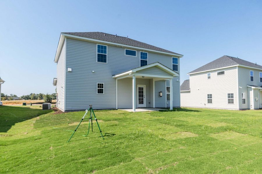 Representative exterior photo of a completed home built from the Meadowbrook by Caviness & Cates Communities in Sutherland Station at Olde Liberty, Franklinton, NC (Image 219). Representative exterior photo of a completed home built from the Meadowbrook by Caviness & Cates Communities in Sutherland Station at Olde Liberty, Franklinton, NC (Image 219).