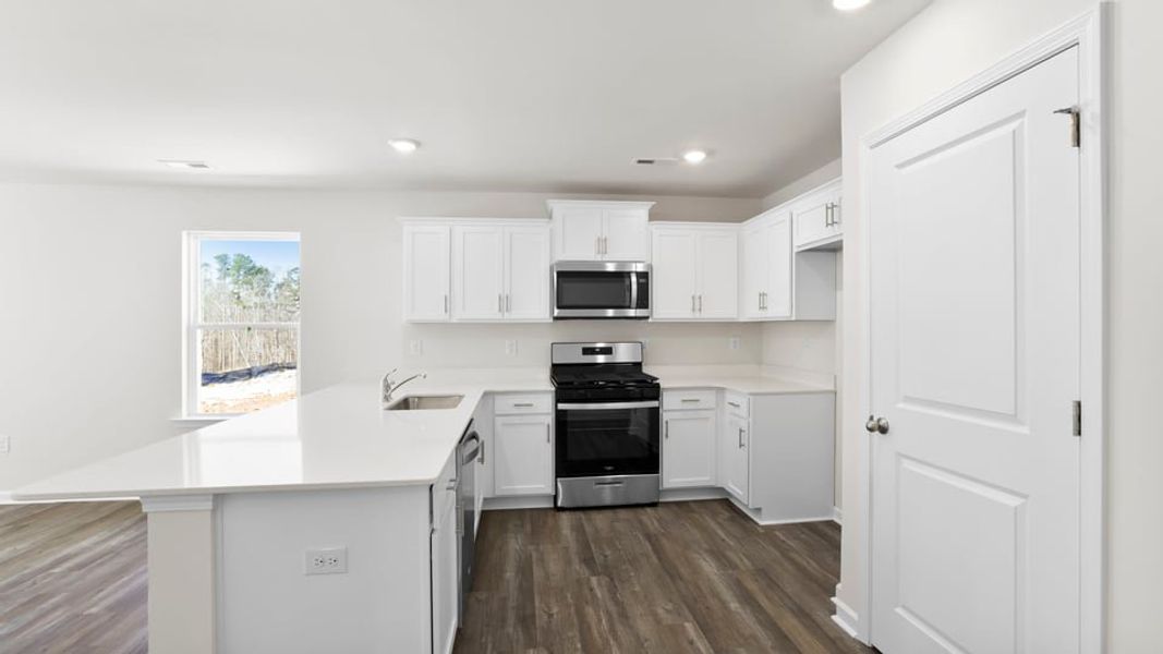 Furnished interior view inside a new home in Harper Ridge, Roebuck (Image 7).