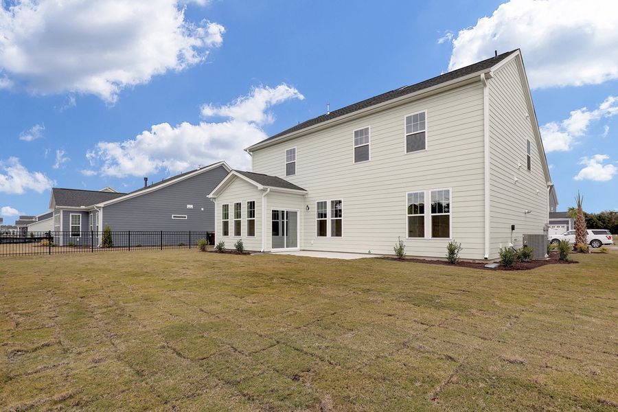 Exterior details and patio area of a home in East Wynd, Hampstead (Image 19).
