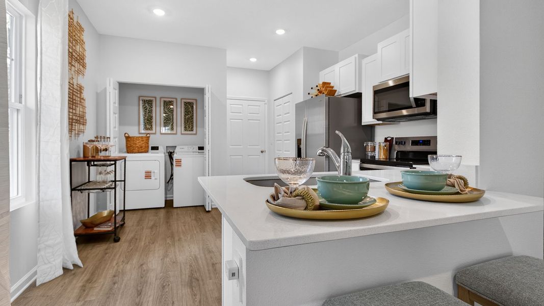 Representative furnished interior of a home built from the Bailey by D.R. Horton in Liberty Cove Townhomes, Yulee (Image 9).