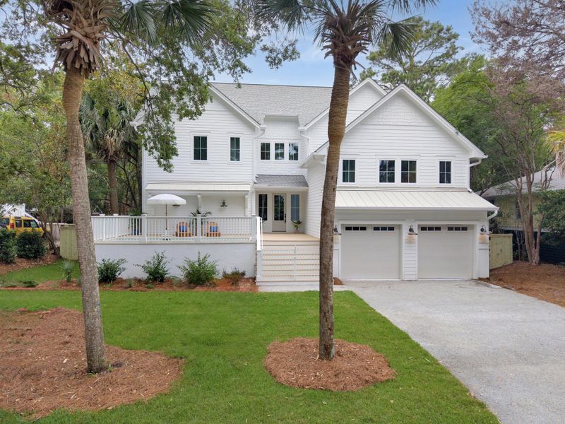Front exterior of a new home in , Isle Of Palms, SC, highlighting curb appeal (Image 2). Front exterior of a new home in , Isle Of Palms, SC, highlighting curb appeal (Image 2).