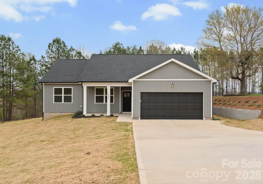Front exterior of a new home in , Shelby, NC, highlighting curb appeal (Image 1). Front exterior of a new home in , Shelby, NC, highlighting curb appeal (Image 1).
