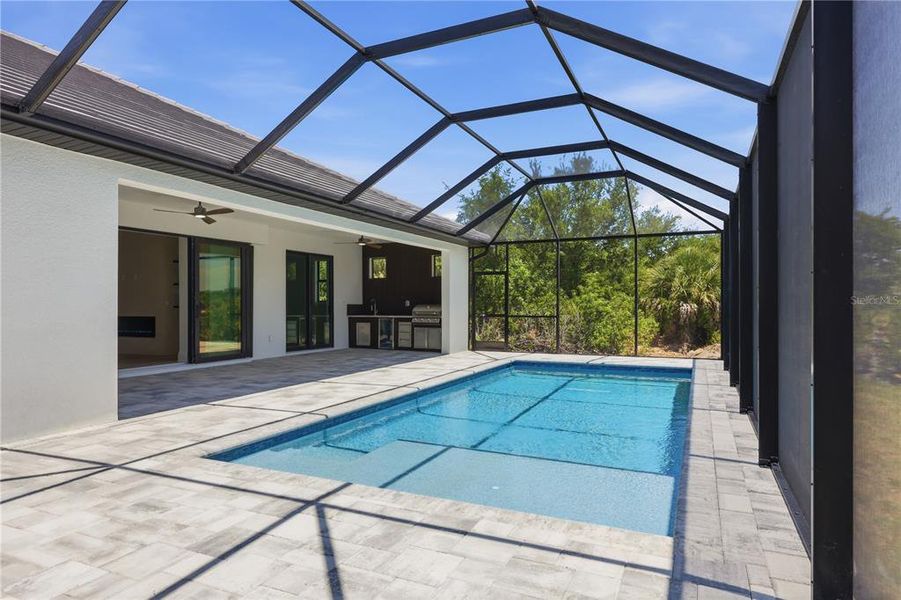 Exterior details and patio area of a home in , Port Charlotte (Image 24).