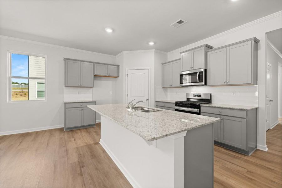 Furnished interior view inside a new home in Northwoods at Mirror Lake, Villa Rica (Image 6).