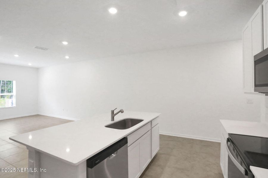 Furnished interior view inside a new home in Atlantis Pointe, Middleburg (Image 7).