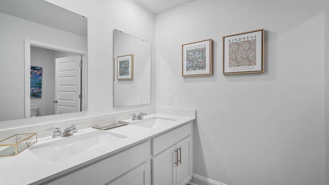 Representative furnished interior of a home built from the Hayden by D.R. Horton in Laurel Grove, Guyton (Image 9).
